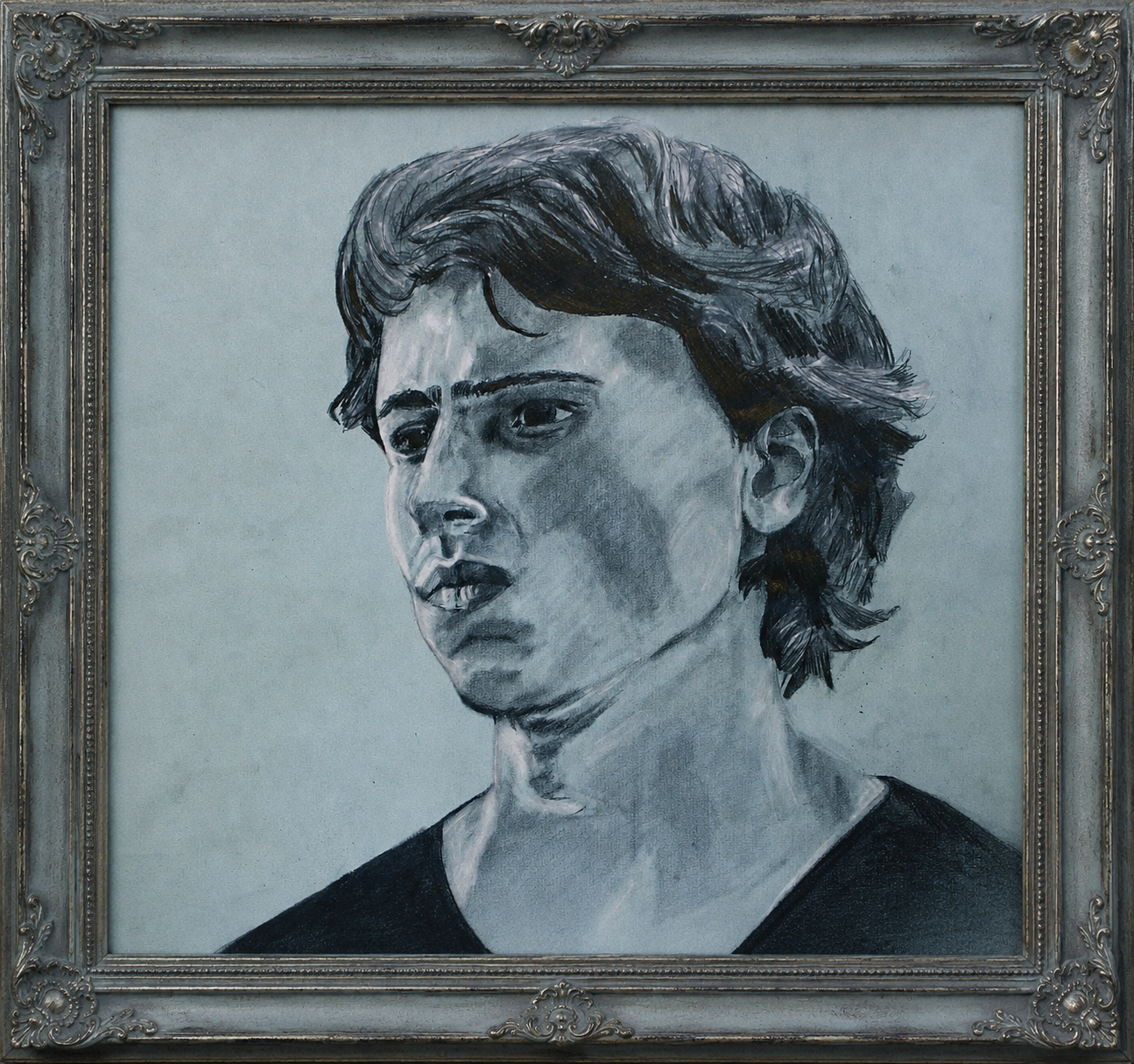 Charcoal portrait in a frame
